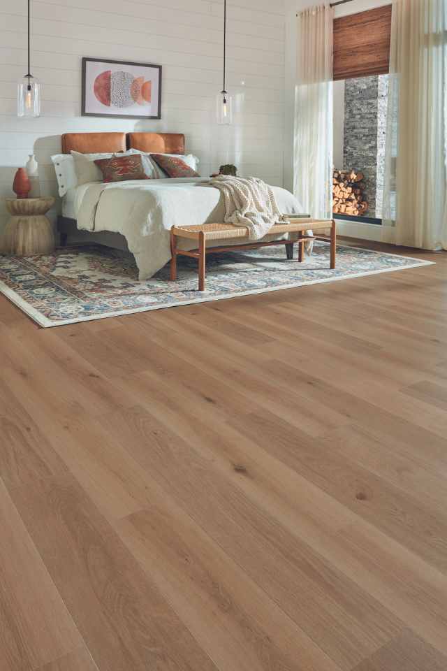 light white oak look laminate in earth toned bedroom with shiplap walls